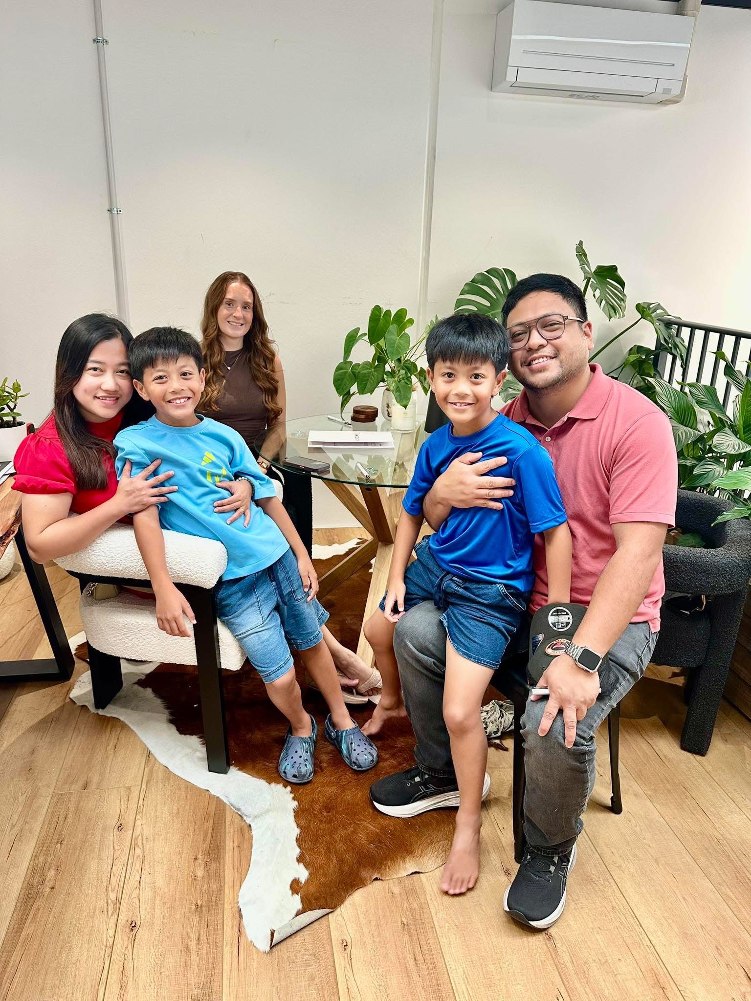 A family visiting the office